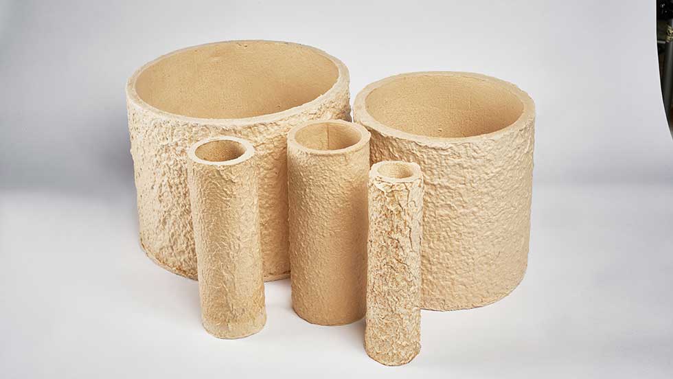 A set of five vacuum-form cast riser sleeves, each made at a custom height and diameter.